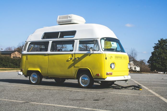 yellow and white volkswagen t-2 van